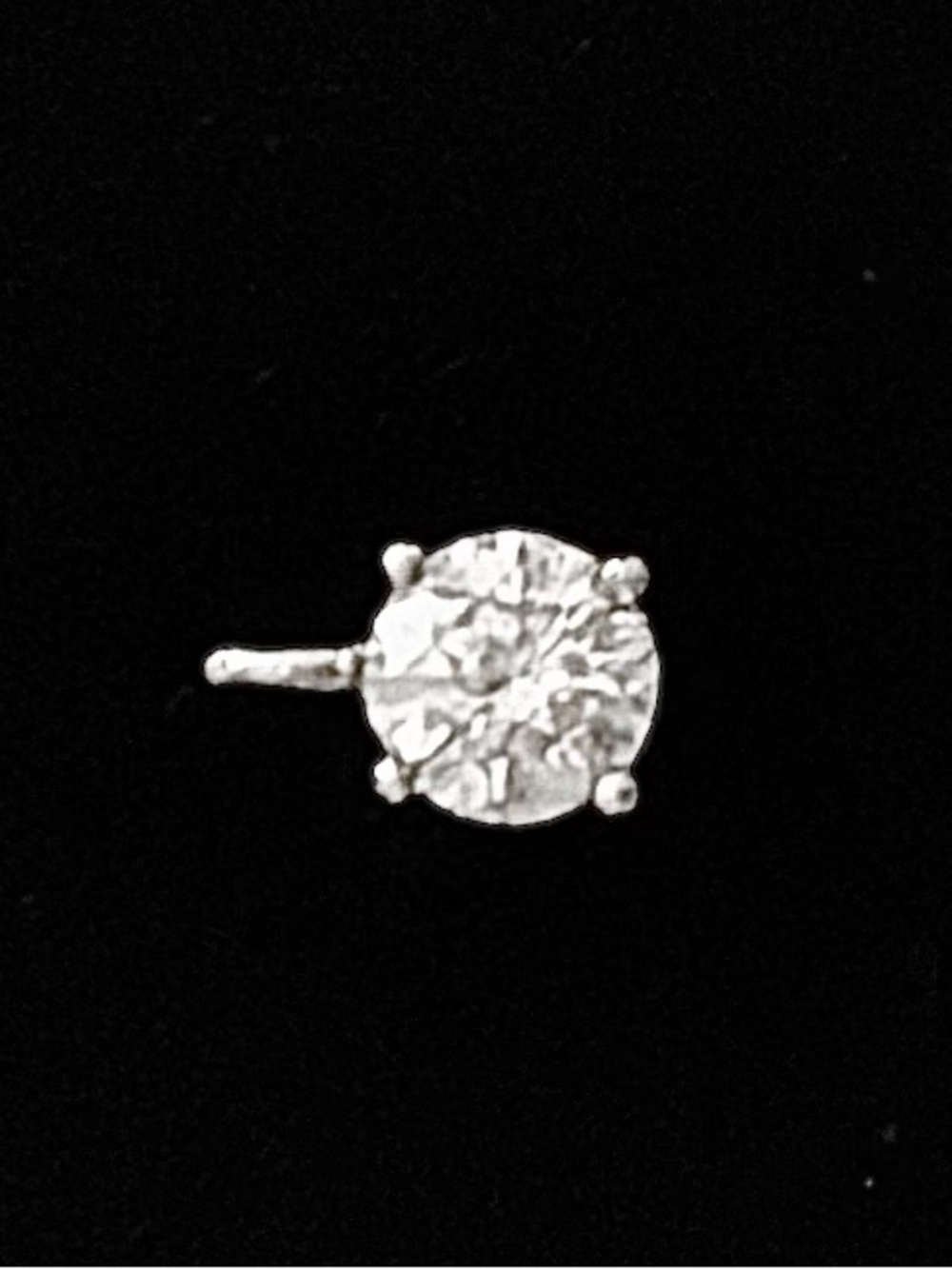 Colorless 0.642 round diamond set in Platinum for necklace. Rare color F, S1-2